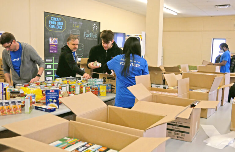 Google team sorting non-perishable food.