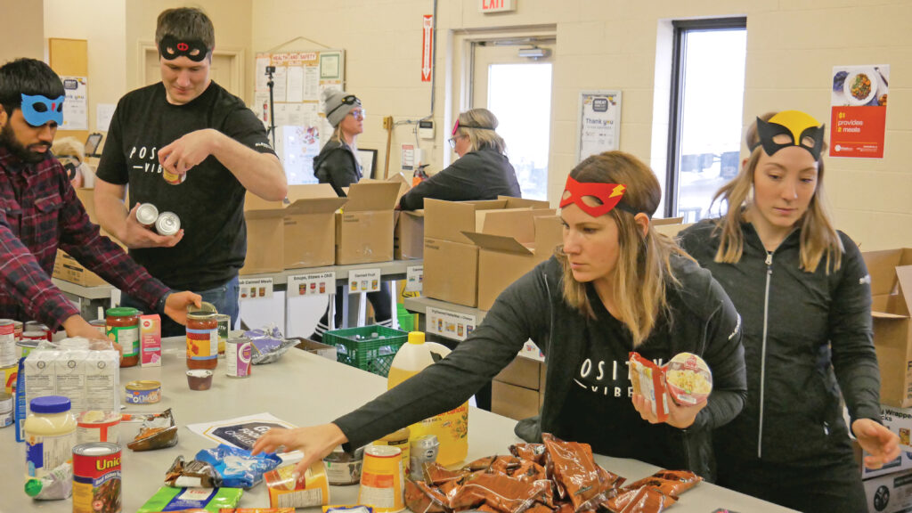 Blendtek team 2 sorting non-perishable food.