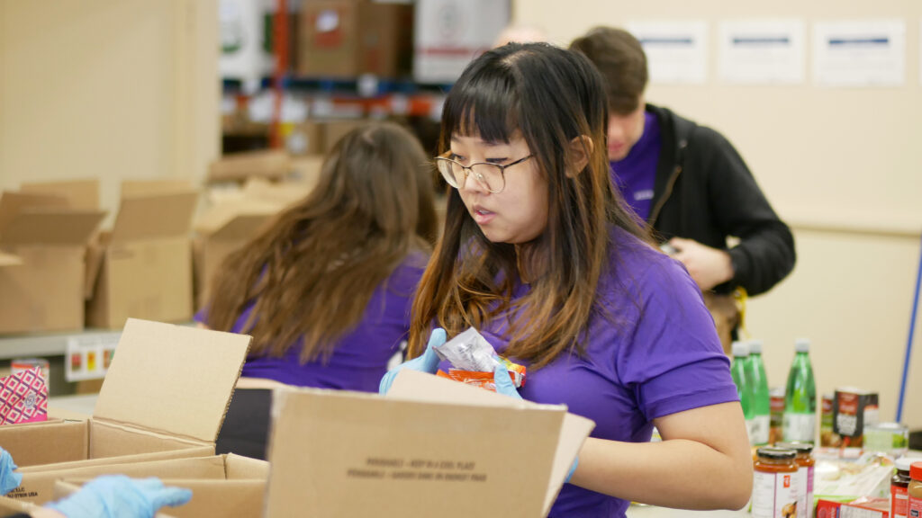 Accommod8u team 1 sorting non-perishable food.