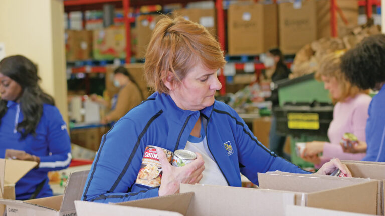 RBC Kitchener Commercial team sorting non-perishable food.