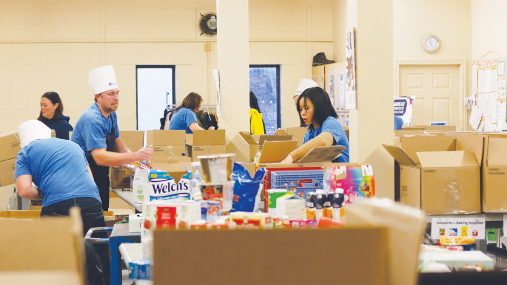MTE team unloading and sorting non-perishable food.