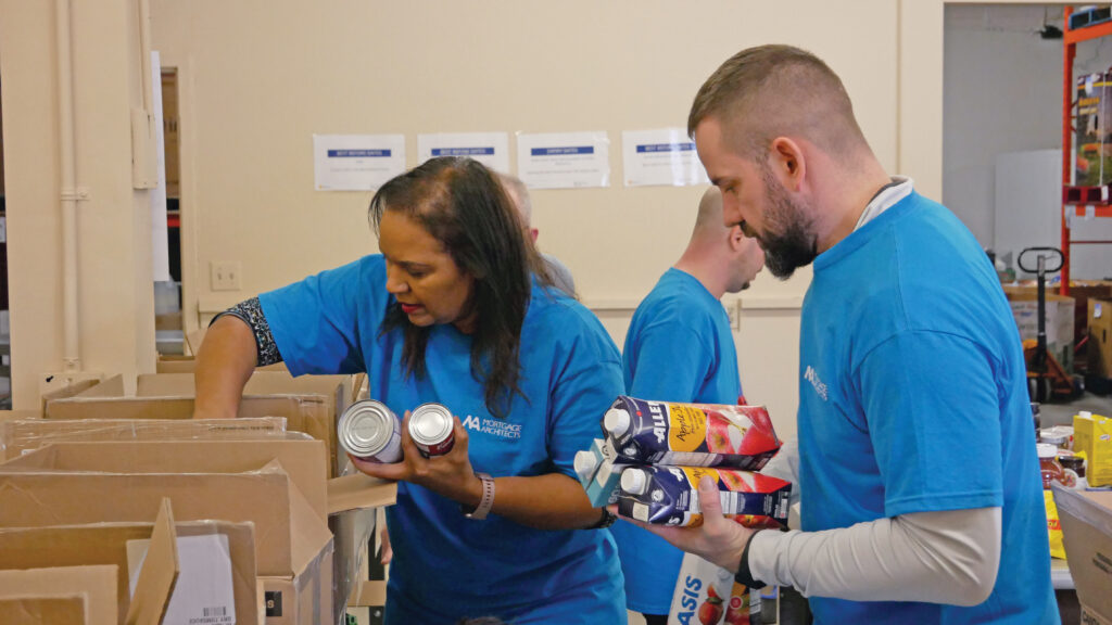 Bennet Capital team sorting non-perishable food.
