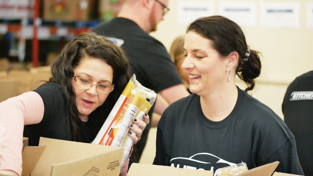 Kitchener Ford team sorting non-perishable food.