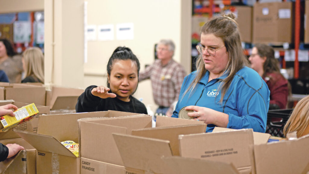 Libro team sorting non-perishable food.