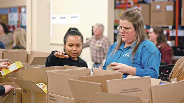 Libro team sorting non-perishable food.