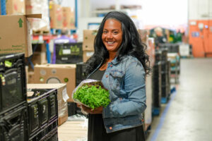 Nicole Marinelli in The Food Bank’s warehouse.