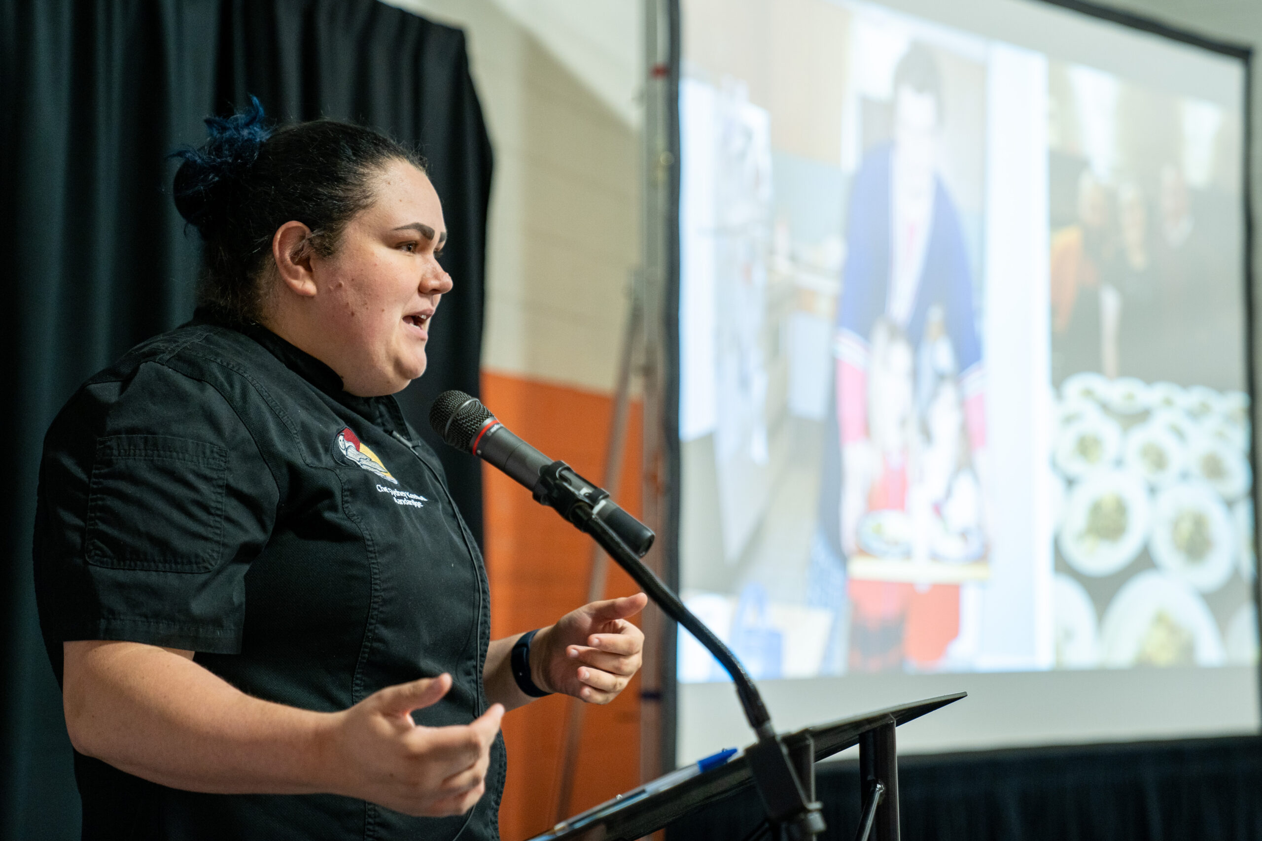 Sydney Keedwell speaking at Waffles in the Warehouse.