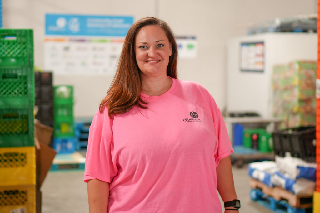 Laura Anglin in The Food Bank’s warehouse.