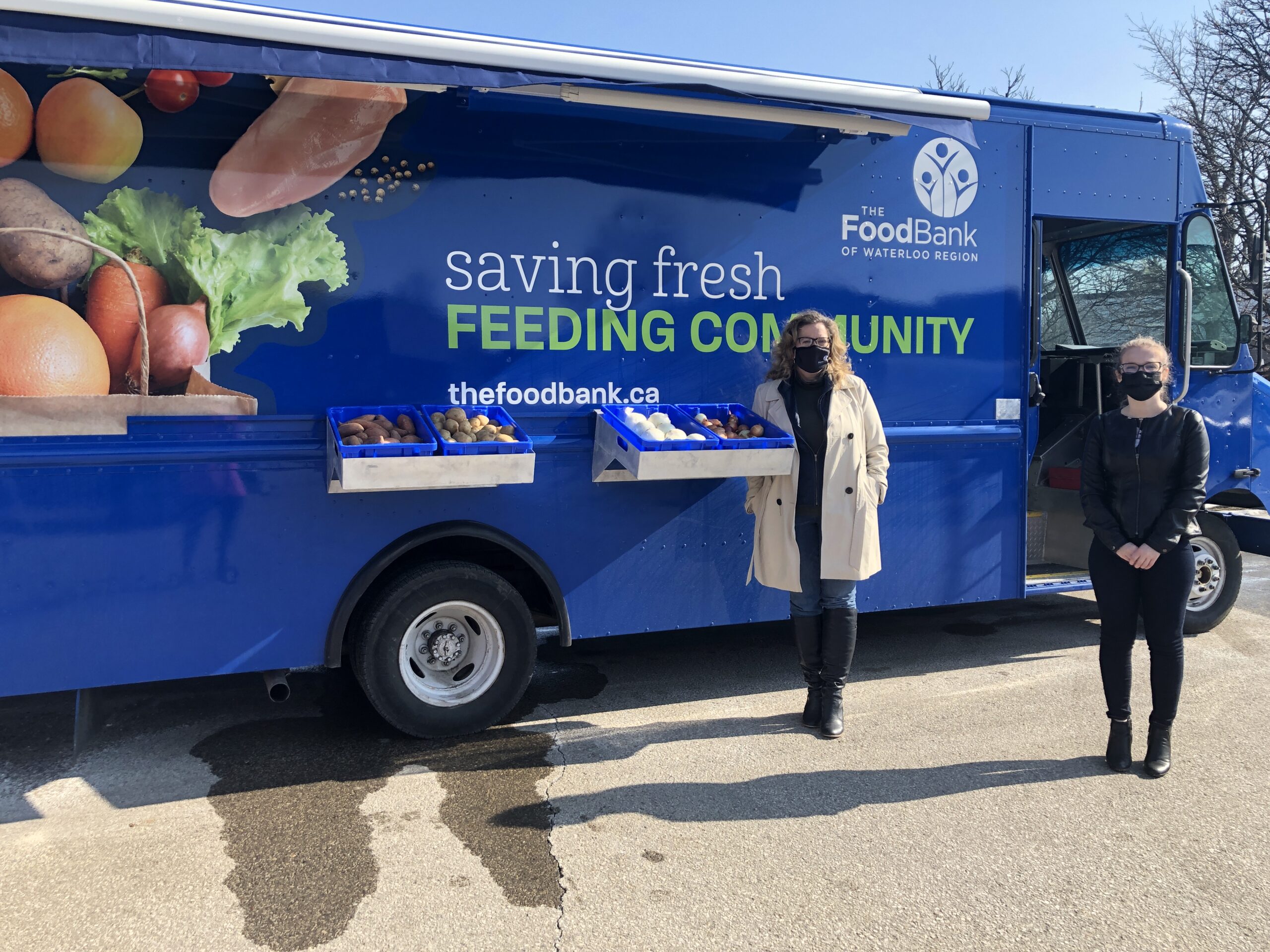 MPP Amy Fee and CEO, Wendi Campbell standing in front of the Mobile Pantry