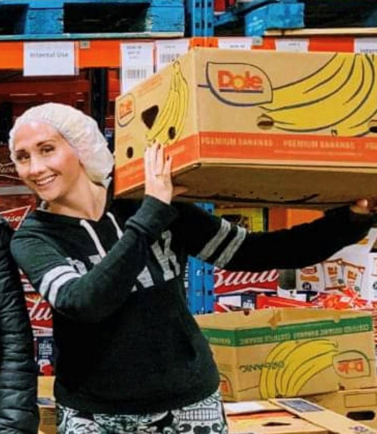 Kitty volunteering at The Food Bank.