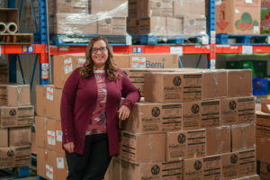 Lydia Tavares in The Food Bank’s warehouse.