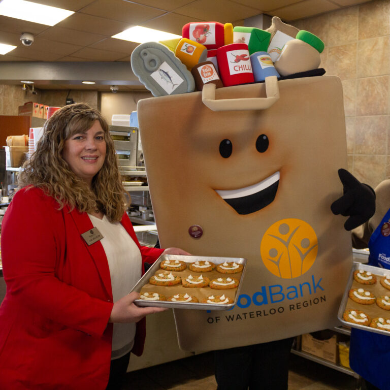 Kim and our mascot Phil with Holiday Smile Cookies