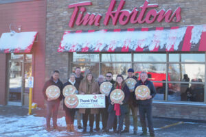 Tim Hortons Holiday Smile Cookie cheque presentation to The Food Bank of Waterloo Region, Tim Hortons Foundation Camps.