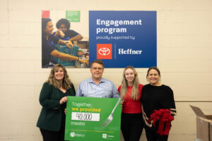 Kim Wilhelm, CEO, The Food Bank of Waterloo Region, Willy Heffner, president, Heffner Toyota, Meghan Waldbillig, engagement coordinator, The Food Bank of Waterloo Region, and Melissa Brüggemann, marketing and events team lead, Heffner Toyota are pictured in the Engagement room.