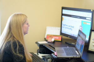 Michelle Rickard at her desk.