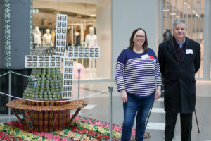 Stephanie and Kevin are pictured with Stubbe’s Precast’s structure, Turning Hunger Around.
