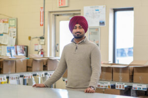 National Voluntter Week spotlight: Manjinder Singh in The Food Bank’s Engagement room.
