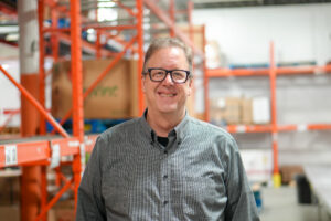 David Brenneman in The Food Bank's warehouse.