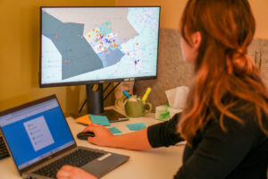 Rebecca Jeschke looking at the Community Food Assistance Network map.